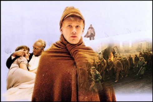 Égő zsiráf a lebombázott városban